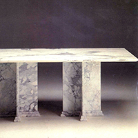 'Caio' Tavolo in marmo base a crociera. Porcinai/Pratelli. Valdera marmi - 1989